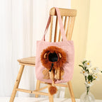 Pink lion-detail tote in an unavailable color