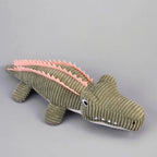 Gray corduroy crocodile toy from the front