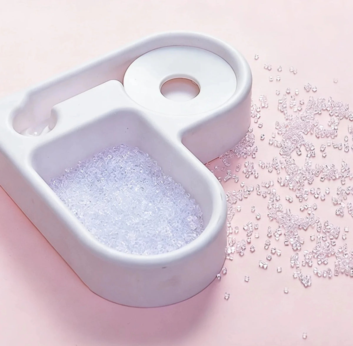 White heart-shaped food bowl and partitioned water area