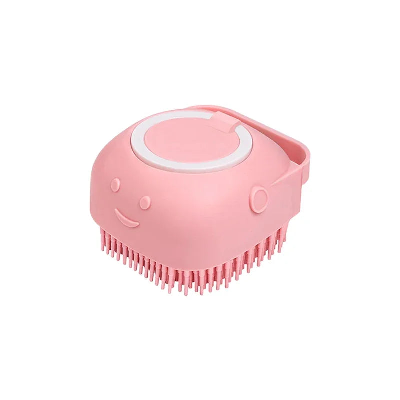 Pink shampoo-dispensing pet bath brush