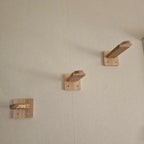 Two small natural wood cat wall steps