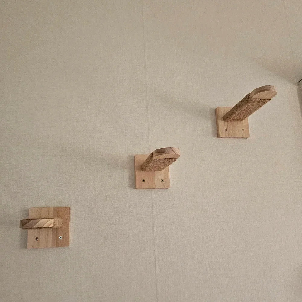 Two small natural wood cat wall steps