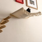 Cream fabric hammock and wall steps installed for a cat