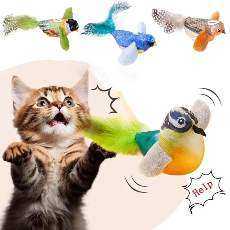 Cat batting a hanging bird toy