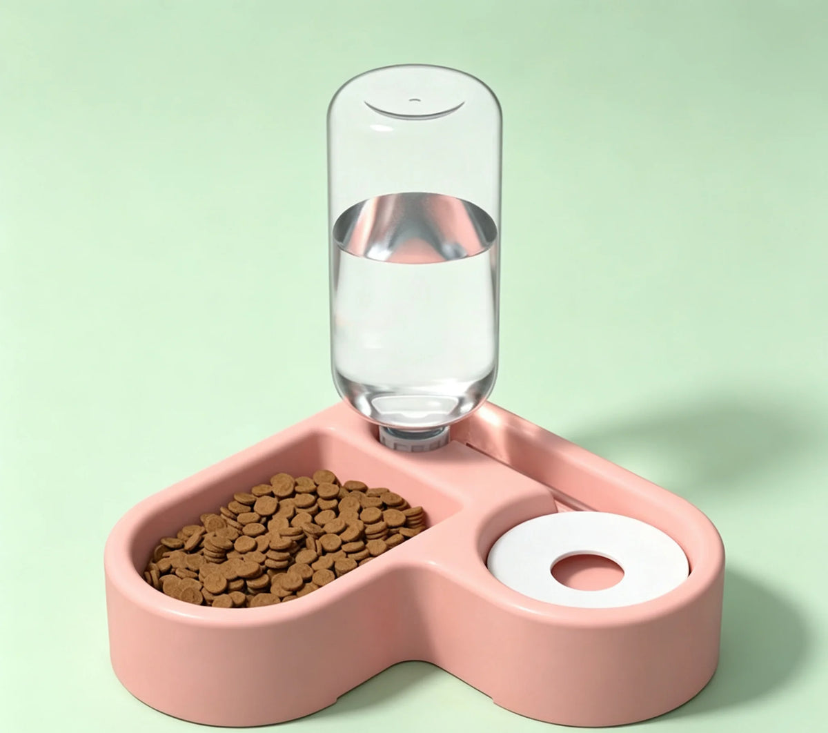 Pink heart-shaped gravity water and food bowl
