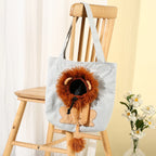Gray lion-detail tote carried over the shoulder