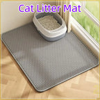 Gray double-layer cat litter mat beside a litter box