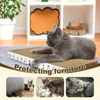 Cat lounging on a cardboard scratcher near a sofa