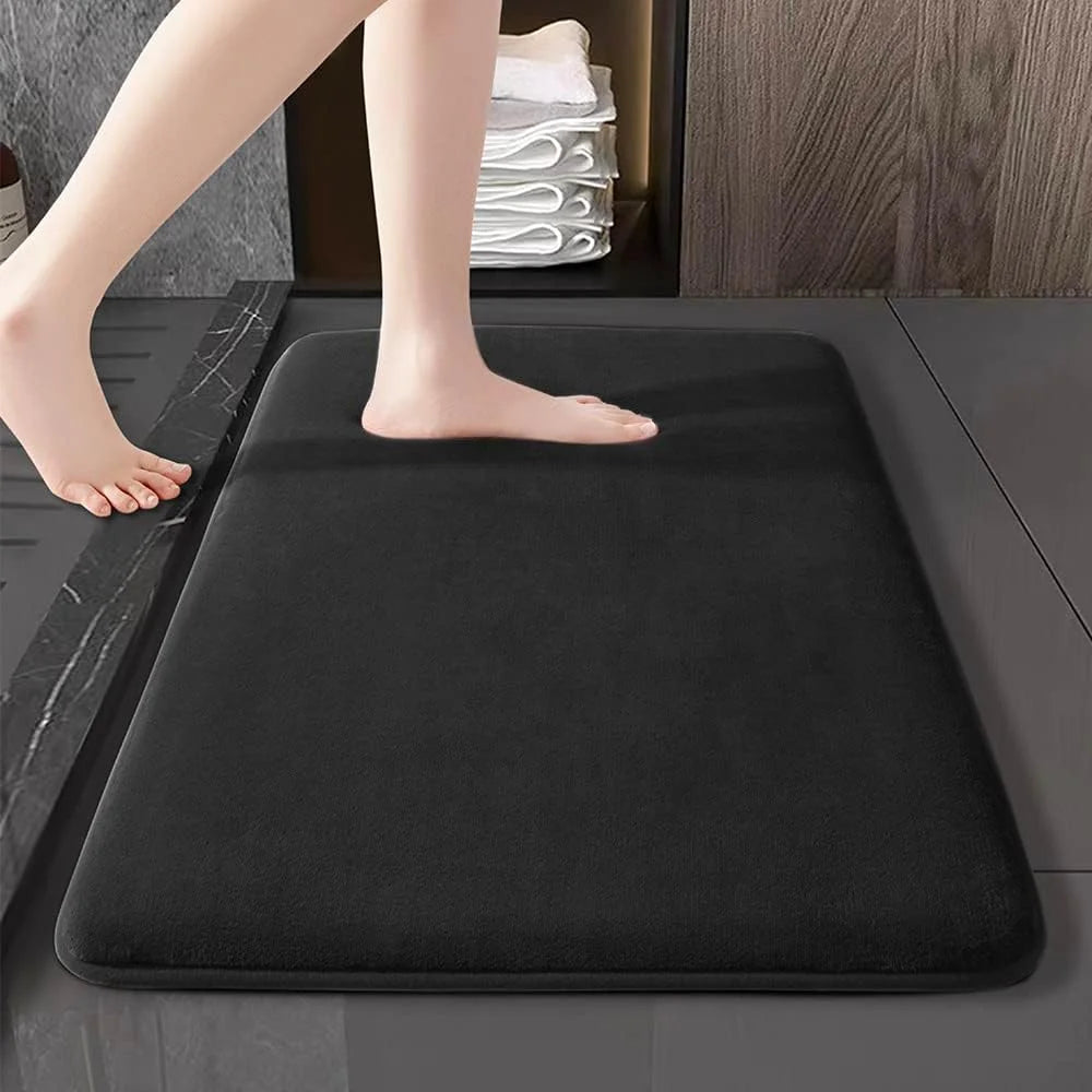 Black rectangular memory-foam bath mat