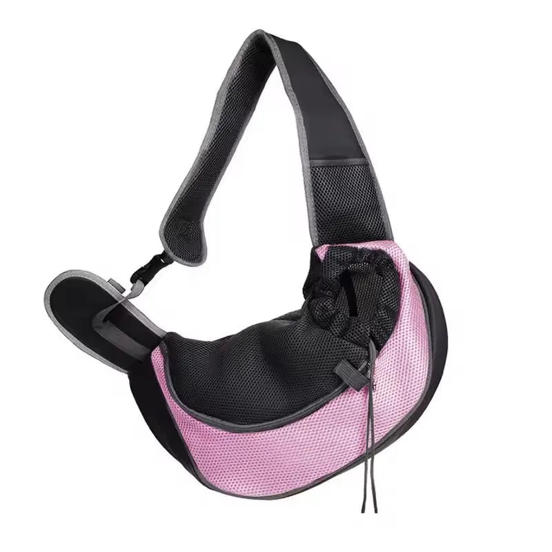 Pink and gray crossbody pet sling on white background