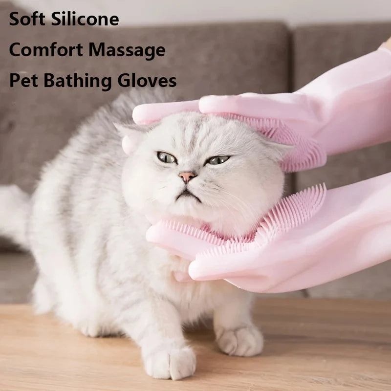 Pink silicone gloves grooming a cat