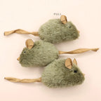 Three plush mouse toys with long fabric tails