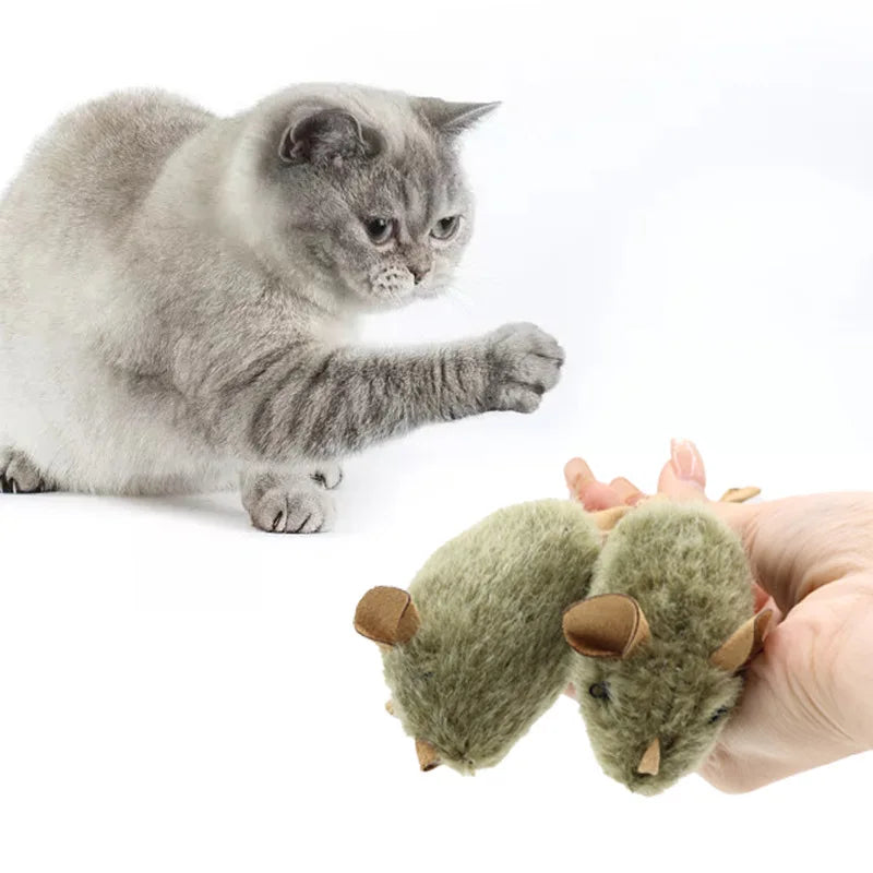 Olive-gray plush mouse toy held in one hand