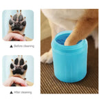 Dog paw inside a blue cleaner cup