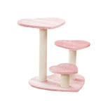 Pink heart-platform cat tree on a white background