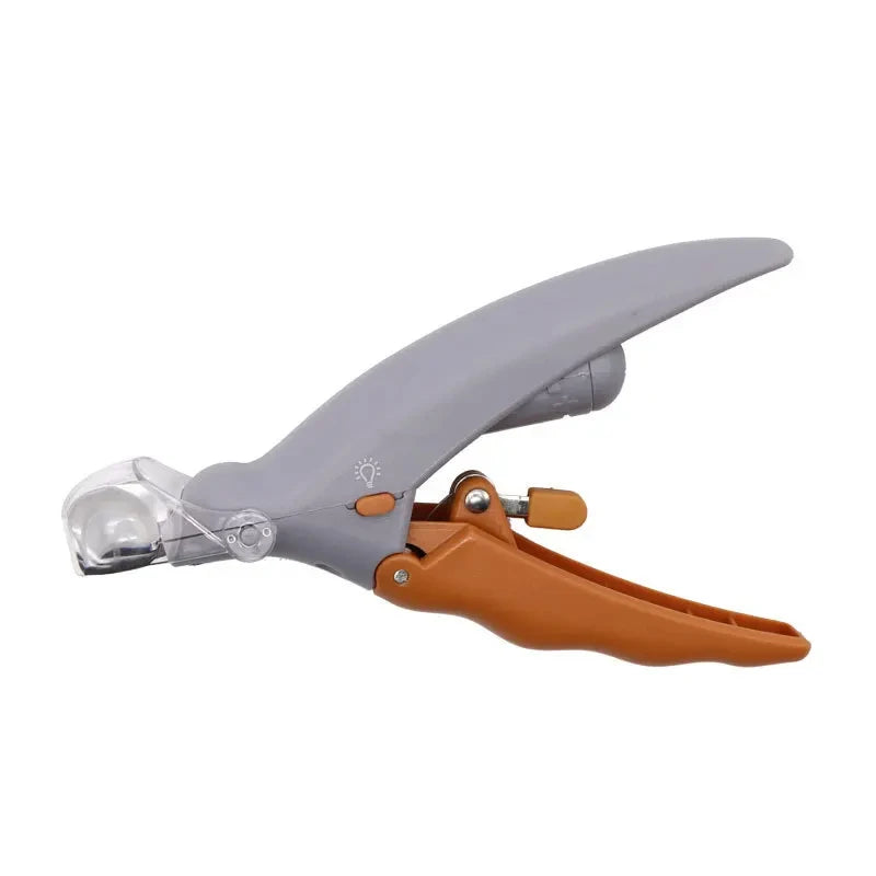 Gray and orange LED pet nail clipper on white