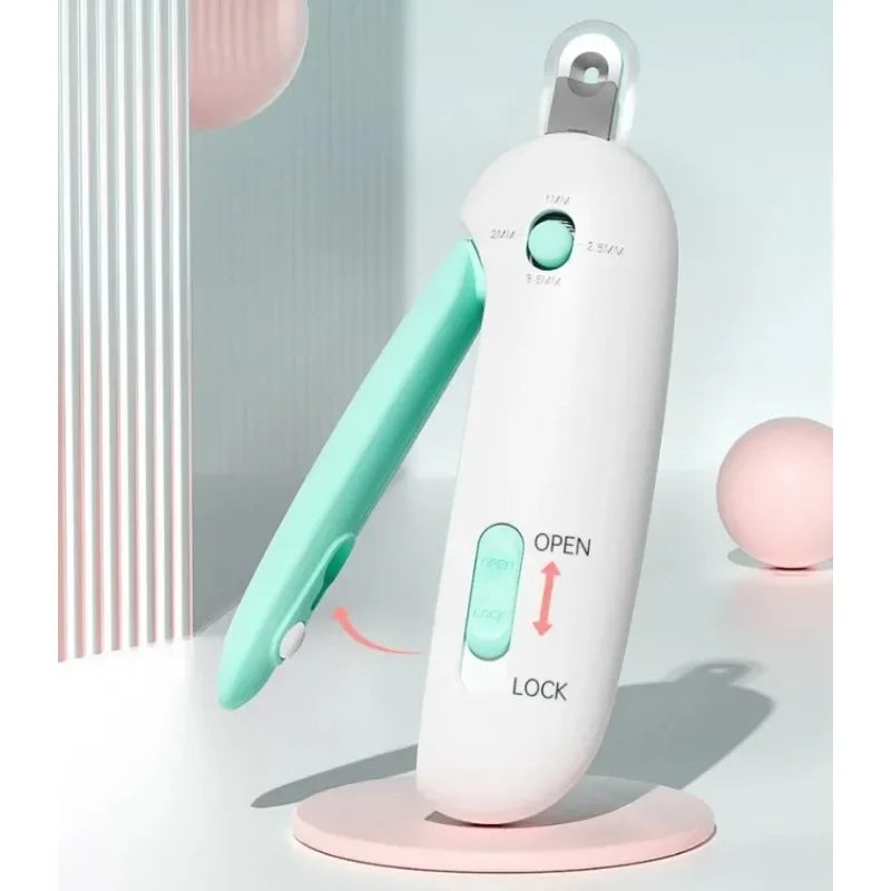 Mint cat nail clipper open beside the sliding handle lock