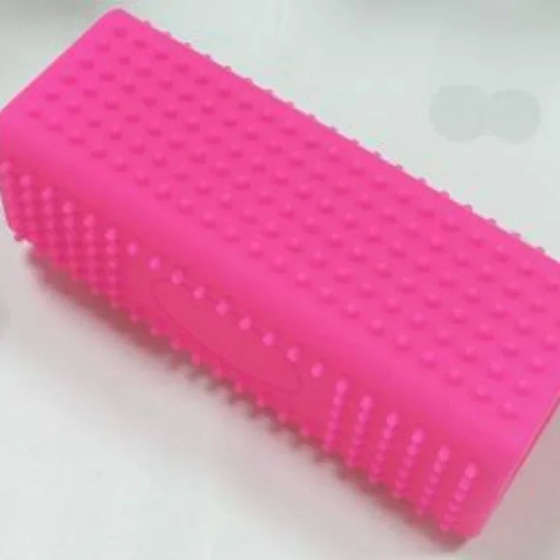 Pink silicone pet hair lifting brush