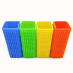 Blue, green, yellow, and orange textured silicone brushes