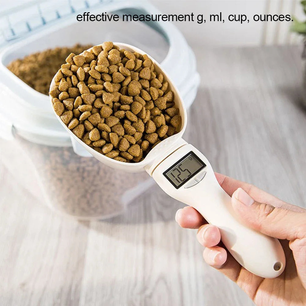 Digital pet food scoop weighing kibble in grams
