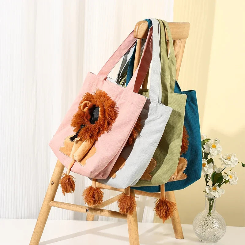 Lion-detail carry totes in colors unavailable for purchase