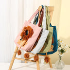 Lion-detail carry totes in colors unavailable for purchase