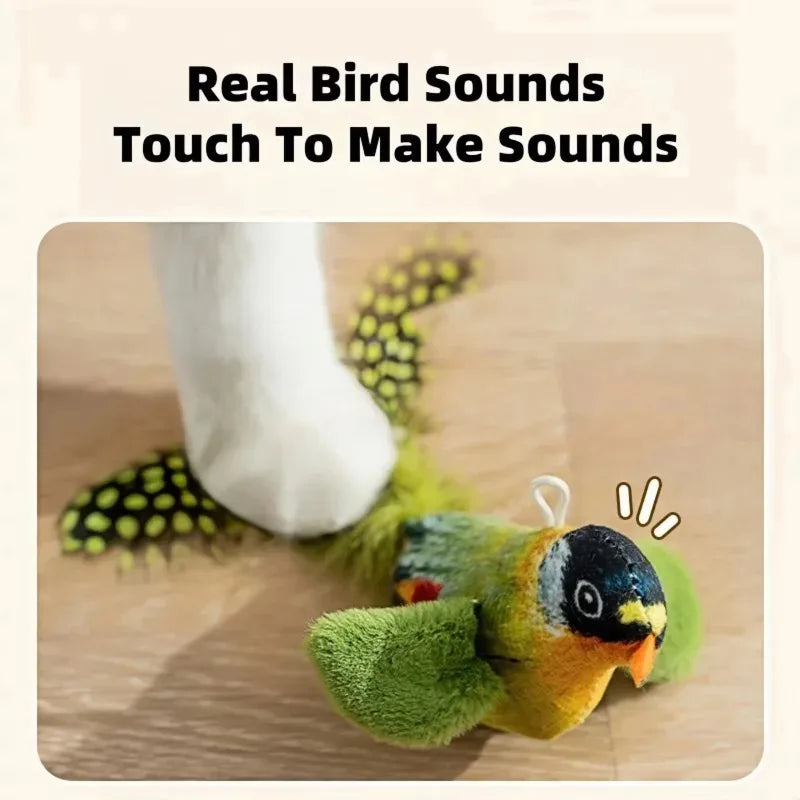 Cat touching a green bird toy to trigger sound