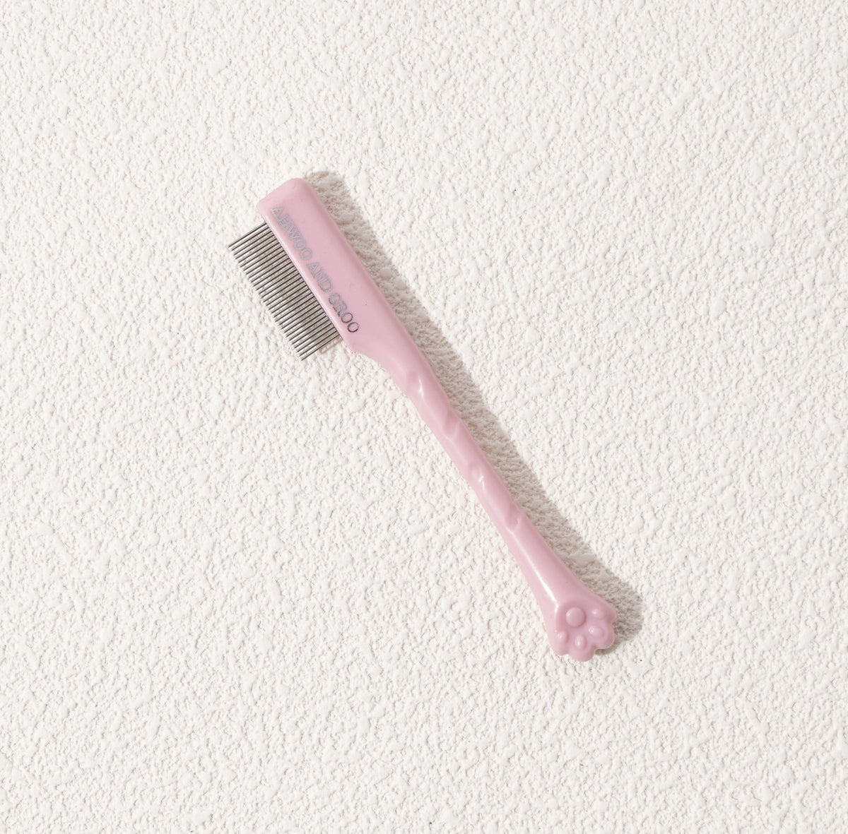 Pink pet face comb