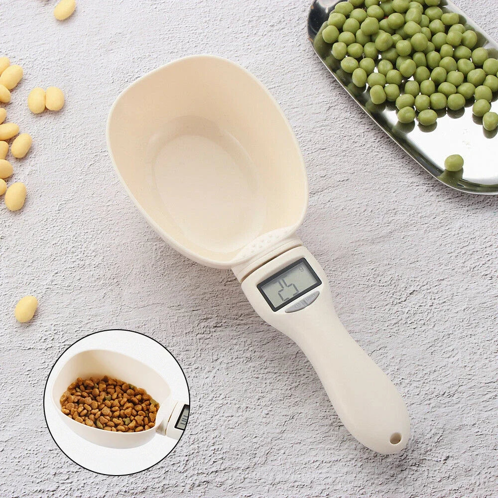 Off-white digital pet food measuring scoop on a countertop