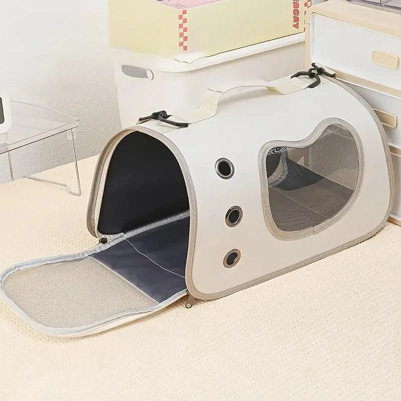 Ventilated soft pet carrier shown during hand carry