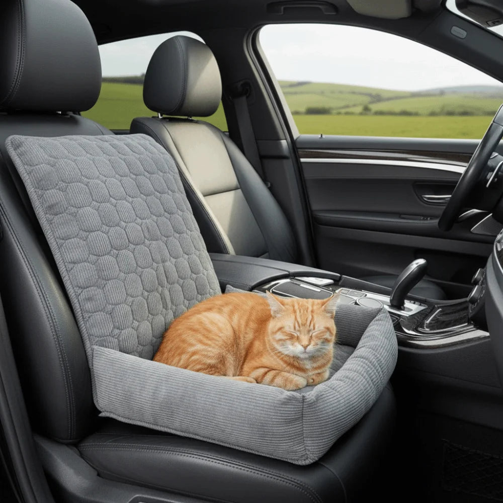 Gray padded pet car bed with a cat