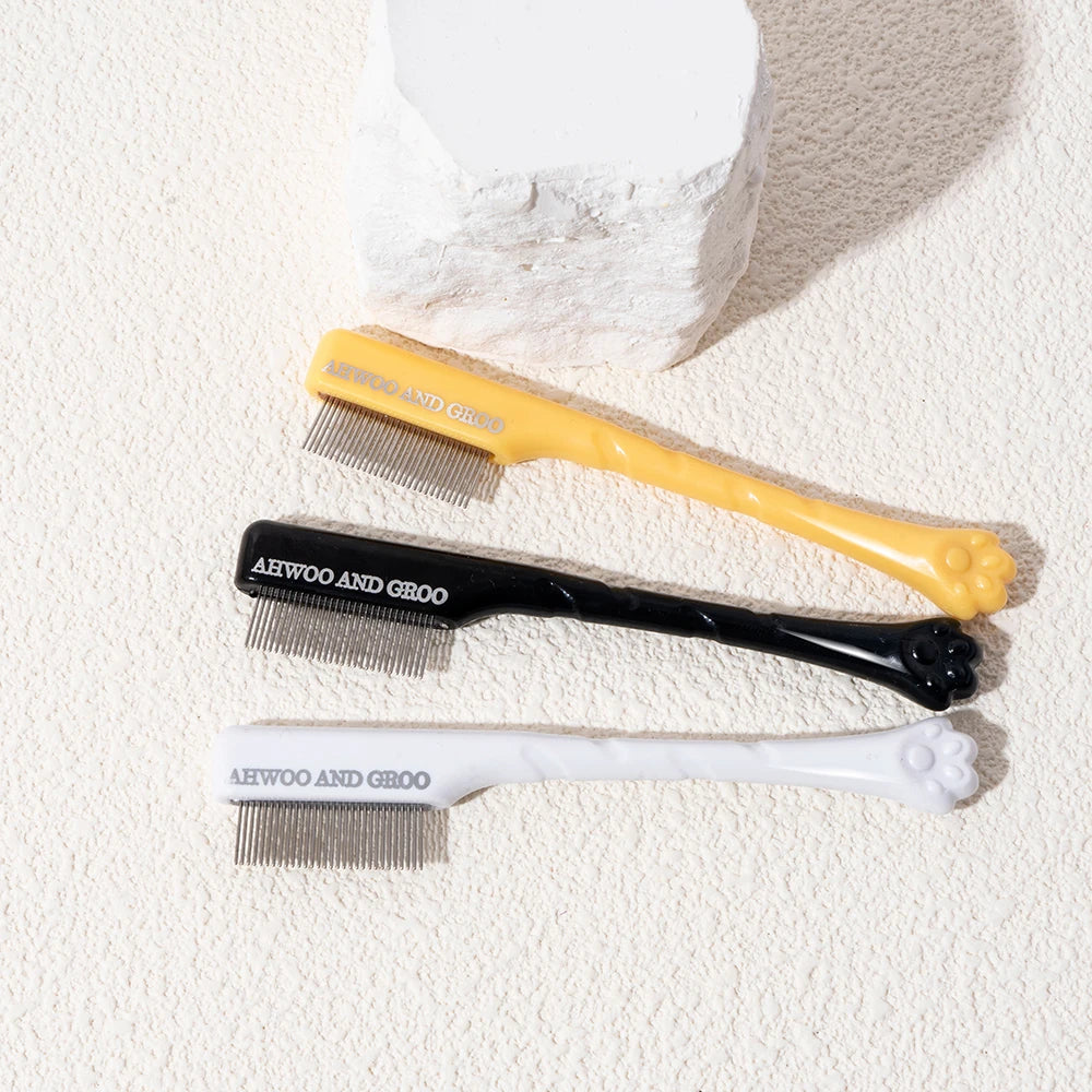 Black, yellow, and white pet facial combs